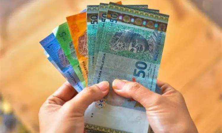 Mata uang Ringgit Malaysia dan Rupiah