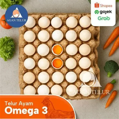 Telur Ayam Segar Sebagai Sumber Protein Butir telur ayam segar di atas meja kayu