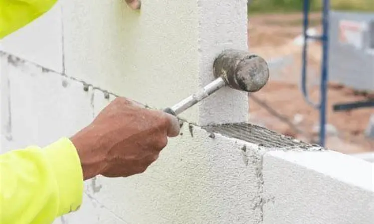 Pemasangan Dinding Hebel Proses pemasangan dinding hebel yang rapi dan presisi