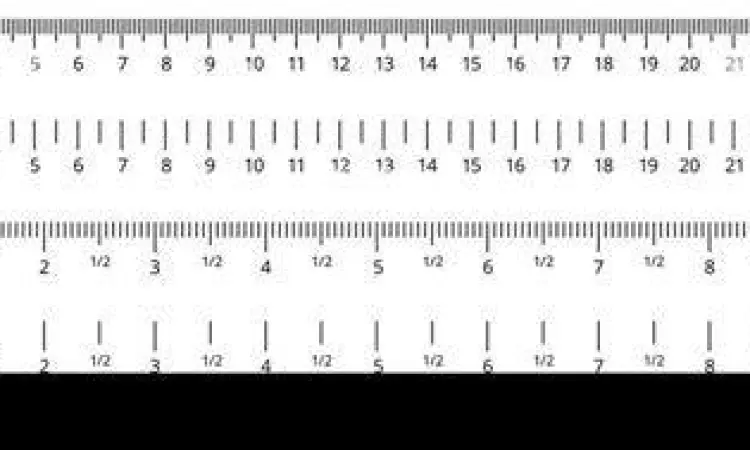 Penggaris menunjukkan skala inci dan centimeter berdampingan