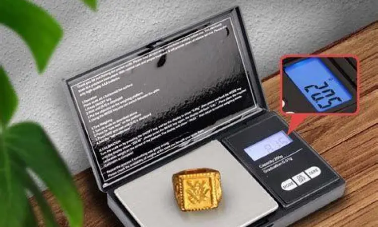 Menimbang berat emas putih 1 gram